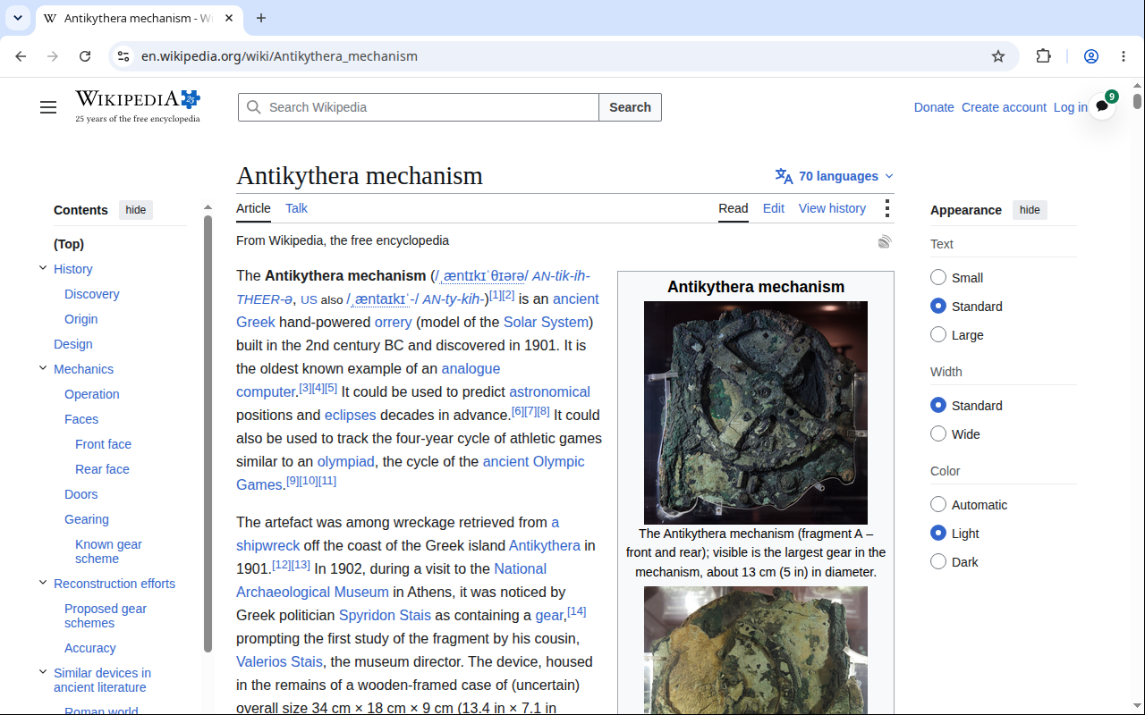 The same Wikipedia article with only a small dark circular mark carrying the number of discussions at the top right of the page